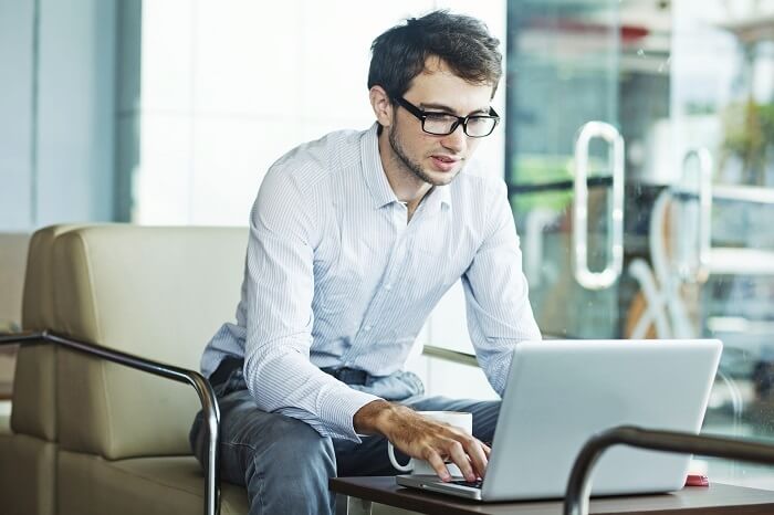 Man On Laptop-New Age AA Meetings Look Like Internet Forums