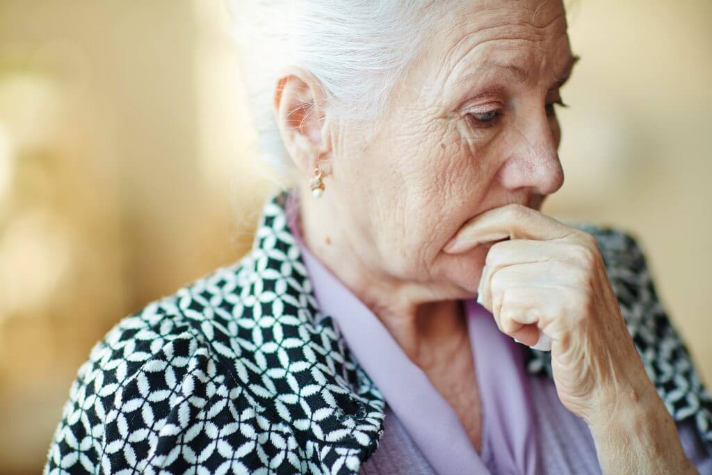 Depressed older woman in a deep thought | Alcohol abuse trends in older adults | The Dunes East Hampton