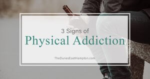 person with walking stick shows 3 signs of physical addiction