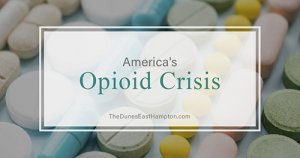 pills on a white background signify Opioid Crisis