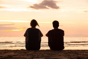 two people on beach receive Opioid Addiction Treatment