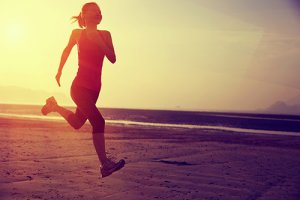 woman running on beach for relapse prevention