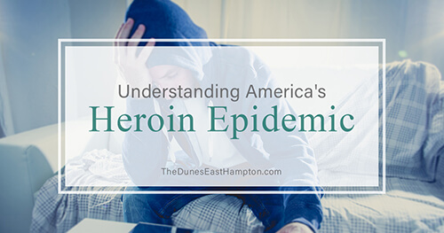 Understanding America’s Heroin Epidemic sad man on couch is victim of heroin epidemic