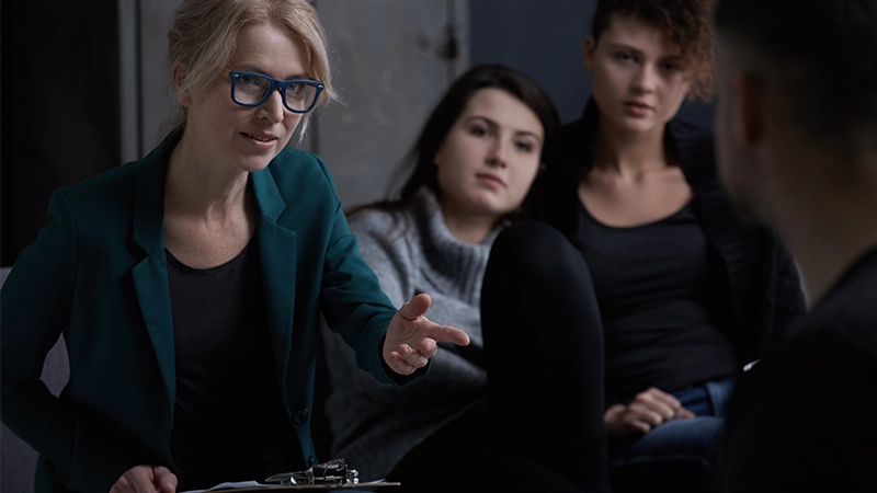 Rehabilitation counselor and his patients during group therapy.