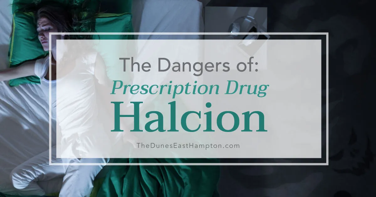 A woman lies in bed on a green pillow, appearing restless or distressed.